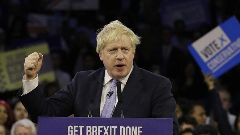 Boris Johnson, UK elections, Brexit, London: Britain's Prime Minister Boris Johnson speaks during his ruling Conservative Party's final election campaign rally at the Copper Box Arena in London, Wednesday, Dec. 11, 2019 | Britain goes to the polls on Dec. 12 | AP/PTI