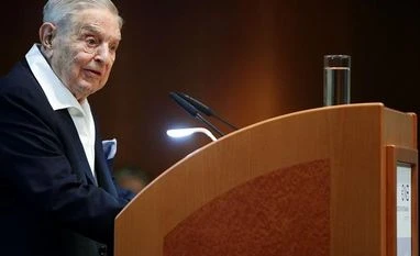 George Soros bought up stocks linked to Bill Hwang's Archegos implosion George Soros