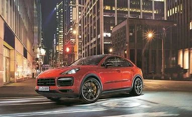Porsche's bet: Rich Indians will show off EVs to boost their street cred Porche electric Taycan model
