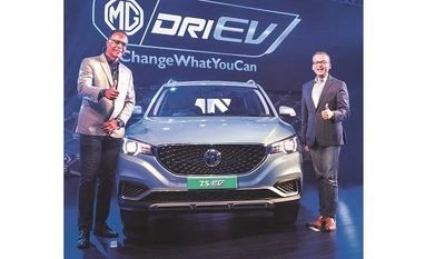 MG Motor India starts bookings for its upcoming electric SUV ZS EV MG Motor India president & MD Rajeev Chaba (left) unveiling the company’s electric car model ZS