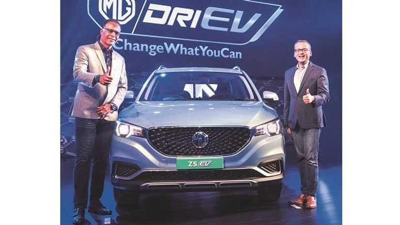 MG Motor India president & MD Rajeev Chaba (left) unveiling the company’s electric car model ZS MG Motor India president & MD Rajeev Chaba (left) unveiling the company’s electric car model ZS earlier this month. Photo: PTI
