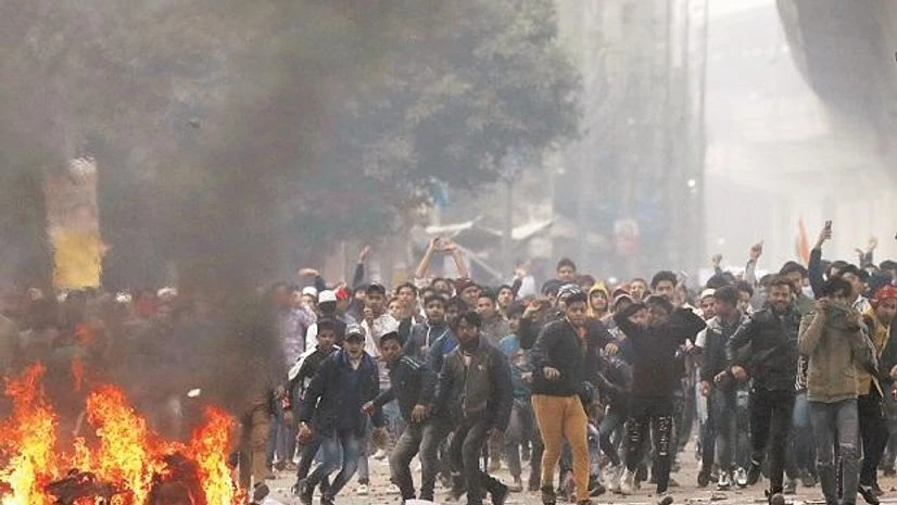 citizenship act, CAA, CAB Demonstrators protest against the new citizenship law in the Seelampur area of New Delhi. Photo: Reuters