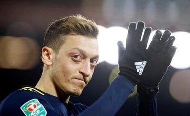 Fifa World Cup: Qatar fans hit back at Germany by recalling Ozil in protest Mesut Ozil
