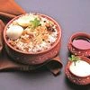 Egg biriyani served with raita