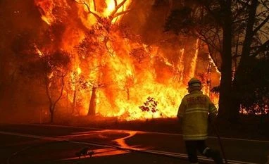 Australia PM Scott Morrison pledges $1.4 bn more in aid for bushfires Australia, Forest fire, firefighter,