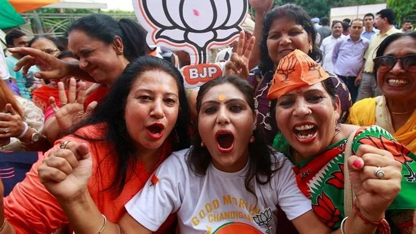 supporters of the BJP celebrate after the results of the Lok Sabha elections. Photo: Reuters supporters of the BJP celebrate after the results of the Lok Sabha elections. Photo: Reuters