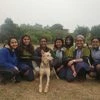 Students of team Pasitivity with Ellie and owner of the dog shelter
