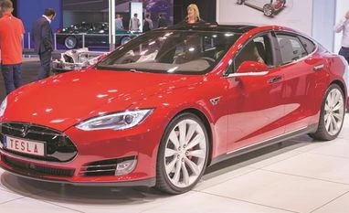 Tesla deliveries set a record and extend red-hot run for shares | INTERNATIONAL COMPANIES NEWS - Business Standard