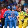 Australian batsman David Warner and Aaron Finch being congratulated by Indian players after they chased down the target to win the first one day international (ODI) cricket match at the Wankhede Stadium in Mumbai. Photo: PTI