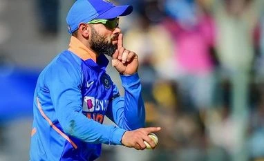 Virat Kohli feels closed-door matches possible but magic will be missing India's Virat Kohli reacts as he celebrates after taking a catch for the dismissal of Australia's Marnus Labuschagne during the third and final ODI cricket match, at Chinnaswamy Stadium in Bengaluru. Photo: PTI