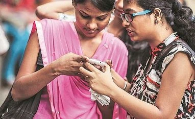 FinMin says govt policies have large number of women beneficiaries young, women, woman, mobile, millenial, youth, worker, jobs