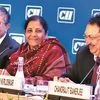 FM Nirmala Sitharaman flanked by CII President Vikram Kirloskar (right) and CII President-Designate Uday Kotak, in New Delhi