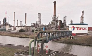 Adani Gas gets regulator's approval for demerger, stake sale to Total SA Oil major Total to invest $510 mn for 50% stake in JV with Adani Green