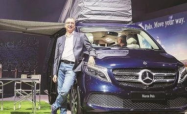 Auto Expo returns after 3 years; some prominent firms to skip event Martin Schwenk, CEO, Mercedes-Benz India, poses with the V-Class Marco Polo | Photo: Sanjay K Sharma