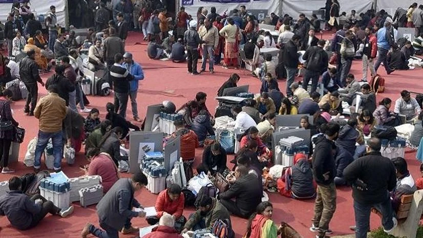 delhi, elections, polls, EVM, voting, booth, EC, Electoral Officials, ASSEMBLY delhi, elections, polls, EVM, voting, booth, EC, Electoral Officials, ASSEMBLY