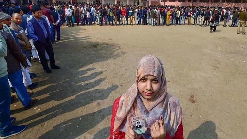 A young woman who voted for the first time, shows her their inked finger after casting vote during the Delhi Assembly election at a polling station in Shaheen Bagh, New Delhi, Saturday, Feb. 8, 2020. (PTI Photo/Manvender Vashist)( Shaheen Bagh, citizenship bill, CAA, Protests, Voters, Voting, Delhi, Elections, Polls