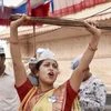 Aam Aadmi Party workers celebrate the party's success in Delhi Assembly polls at Shivaji Chowk, Vashi in Navi Mumbai. Photo: PTI