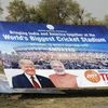 Workers ready a hoarding with pictures of the U. President Donald Trump and India's Prime Minister Narendra Modi as preparations are underway for Trump's forthcoming 'Namaste Trump' event in Ahmedabad. Photo: PTI
