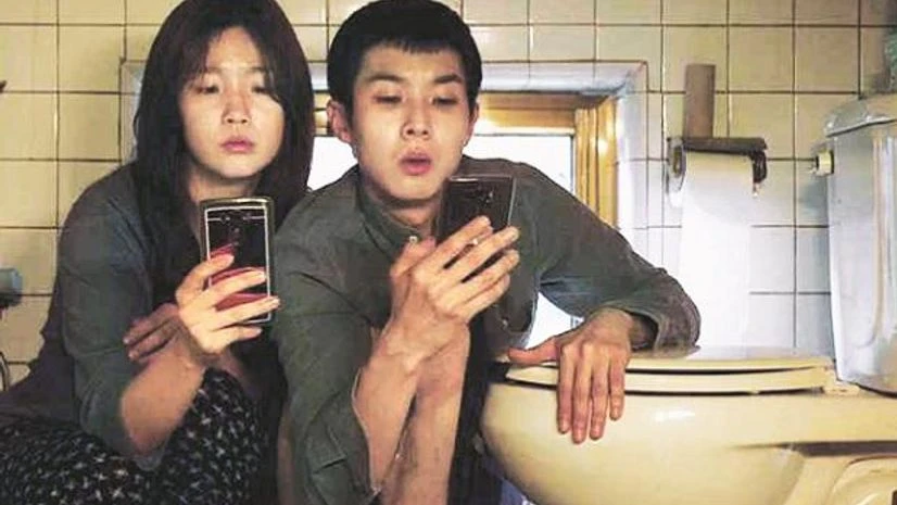 Parasite A still from Parasite: These people all have some talent, determination and drive. What stops them from doing well in their society?