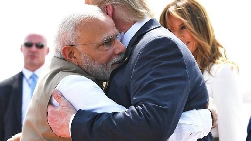 Donald Trump, Narendra Modi, Melania Trump Prime Minister Narendra Modi embraces US President Donald Trump. Photo: @MEAIndia