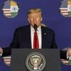US President Donald Trump speaks during a press briefing in New Delhi