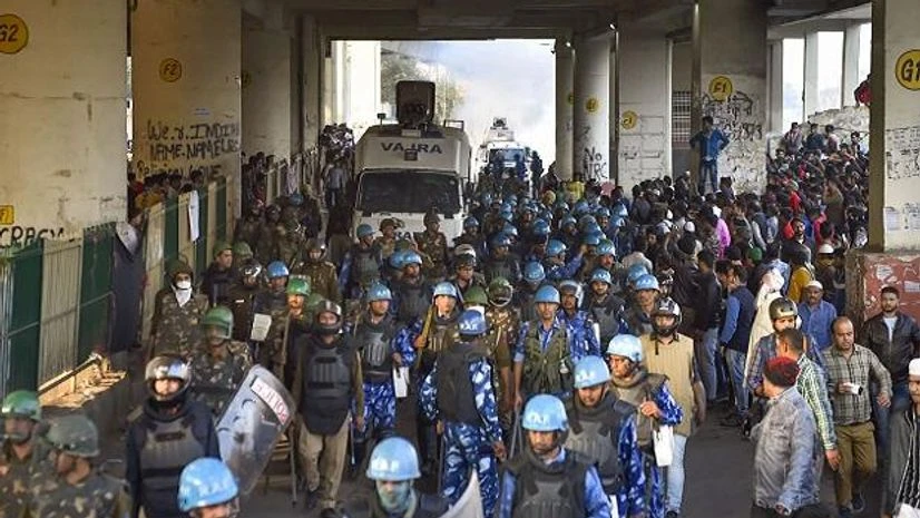 Rapid Action Force , protest, citizenship, violence, CAA, police Rapid Action Force , protest, citizenship, violence, CAA, police