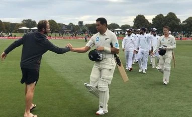 NZ batsman Ross Taylor confident of overcoming calf stain before Tests Kane Williamson shakes hands with Ross Taylor after New Zealand beat India in the 2nd Test of the series. File Photo: @BLACKCAPS