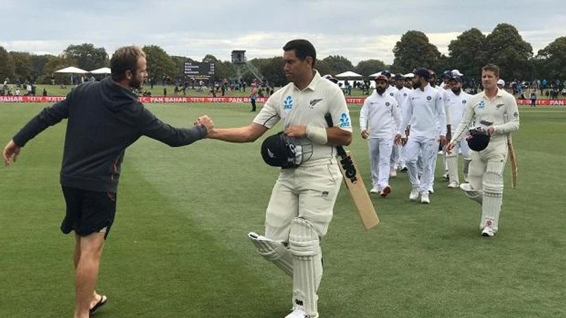 Kane Williamson shakes hands with Ross Taylor after New Zealand beat India in the 2nd Test of the series. File Photo: @BLACKCAPS Kane Williamson shakes hands with Ross Taylor after New Zealand beat India in the 2nd Test of the series. File Photo: @BLACKCAPS
