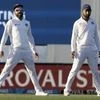 India's Virat Kohli, left, stands with teammate Cheteshwar Pujara during second cricket test between New Zealand and India at Hagley Oval in Christchurch. Photo: AP | PTI