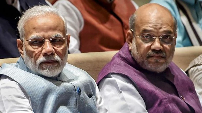 Narendra Modi, Amit Shah Prime Minister Narendra Modi and Union Home Minister Amit Shah attend the BJP Parliamentary Party Meeting in New Delhi. Photo: PTI