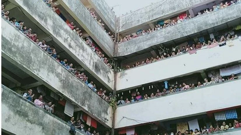 Mumbai residents come out of their homes to cheer health workers. Photo: Kamlesh Pednekar Mumbai residents come out of their homes to cheer health workers. Photo: Kamlesh Pednekar
