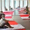 Homeless people take refuge at a sports complex during a nationwide lockdown in the wake of coronavirus pandemic, in New Delhi. Photo: PTI