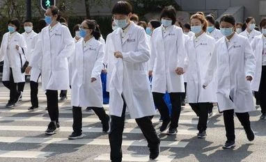 China reports no new coronavirus deaths for first time since January coronavirus, China