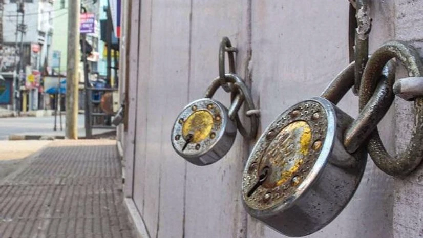lockdown, coronavirus Shops are seen locked during a nationwide lockdown imposed in the wake of coronavirus pandemic in Guwahati. Photo: PTI