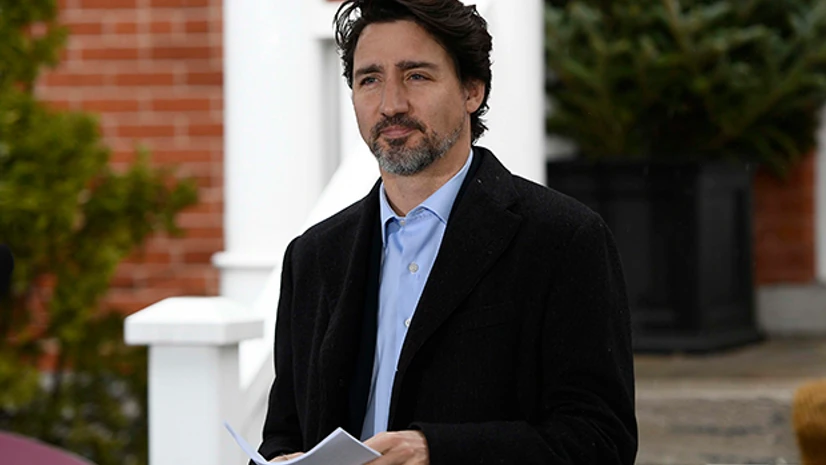Justin Trudeau Canadian Prime Minister Justin Trudeau arrives for his daily press conference on COVID-19, in front of his residence at Rideau Cottage in Ottawa. Photo: PTI