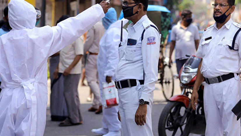 Thermal screening of security personnel being conducted during a nationwide lockdown in the wake of coronavirus pandemic, in Howrah. Photo: PTI Thermal screening of security personnel being conducted during a nationwide lockdown in the wake of coronavirus pandemic, in Howrah. Photo: PTI