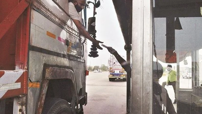 Toll, highway, NHAI, Trucks, roads, transport, drivers Toll, highway, NHAI, Trucks, roads, transport, drivers