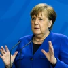 Don't tolerate hate: Outgoing German Chancellor Angela Merkel at farewell
