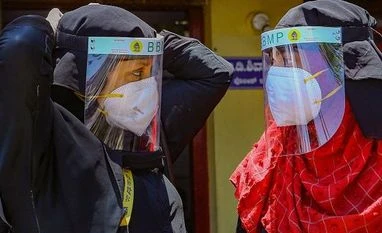 Bengaluru now accounts for 26% of Covid-19 cases in Karnataka: Minister BBMP health workers