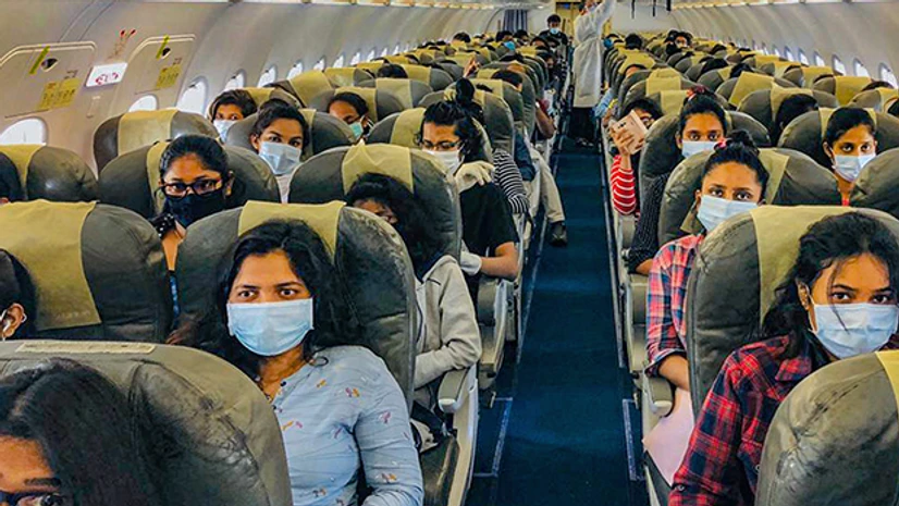 students of Lovely Professional University, coronavirus, lockdown, travel, airways Sri Lankan students of Lovely Professional University (Jalandhar) board a special chartered plane for their home country, during the nationwide lockdown to curb the spread of coronavirus, in Amritsar. Photo: PTI