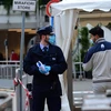 A man wearing a protective face mask enters the FCA Mirafiori plant as it resumes its operations after closure during a lockdown amid the coronavirus disease outbreak in Turin, Italy. Photo: Reuters