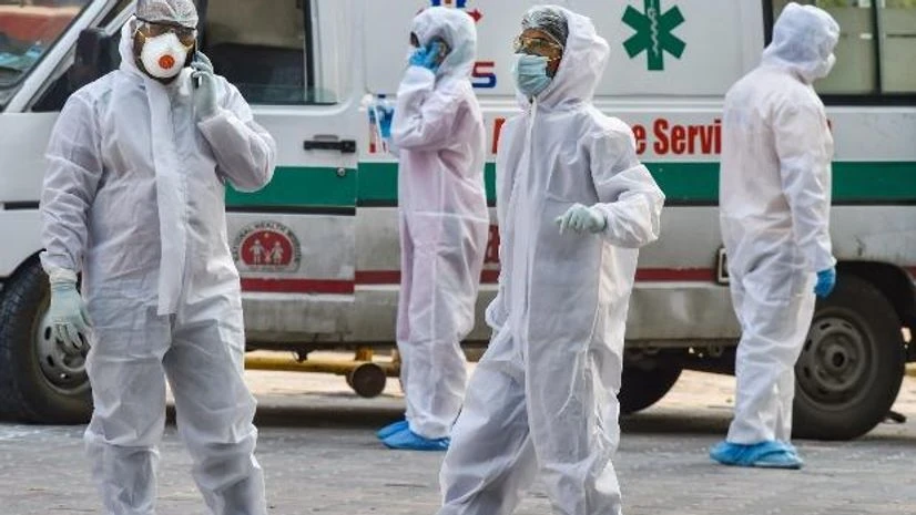 lockdown, coronavirus, Health workers Health workers wearing protective suits are seen in the premises of LNJP Hospital during the nationwide lockdown, in wake of the coronavirus pandemic, in New Delhi