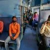 Migrant workers board a special train to return to Agra, during a nationwide lockdown to curb the spread of coronavirus, at a railway station in Ahmedabad