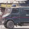 Pulitzer winning picture by AP journalist, Kashmir, J&K Police, protest, armoured vehicle