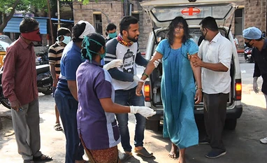 vizag gas leak, LG Polymer, LG Chem Visakhapatnam gas leak, Vizag An affected woman being taken for treatment at King George Hospital after a major chemical gas leakage at LG Polymers industry in RR Venkatapuram village, Visakhapatnam. Photo: PTI