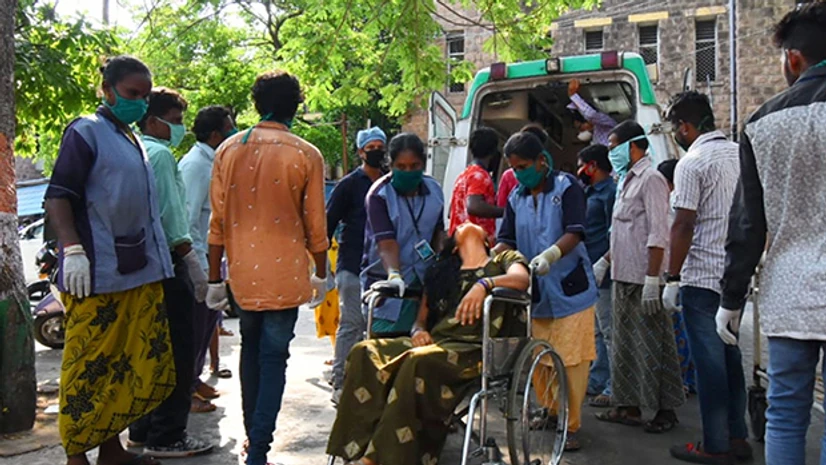 Vizag gas leak, LG Polymer, LG Chem Visakhapatnam gas leak, Vizag An affected woman on a wheelchair being taken for treatment at King George Hospital after a major chemical gas leakage at LG Polymers industry in RR Venkatapuram village, Visakhapatnam. Photo: PTI