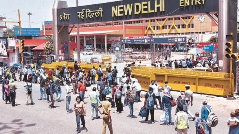 New Delhi railway station, workers, passengers, trains, railways, coronavirus, lockdown, migrants, traffic New Delhi railway station, workers, passengers, trains, railways, coronavirus, lockdown, migrants, traffic