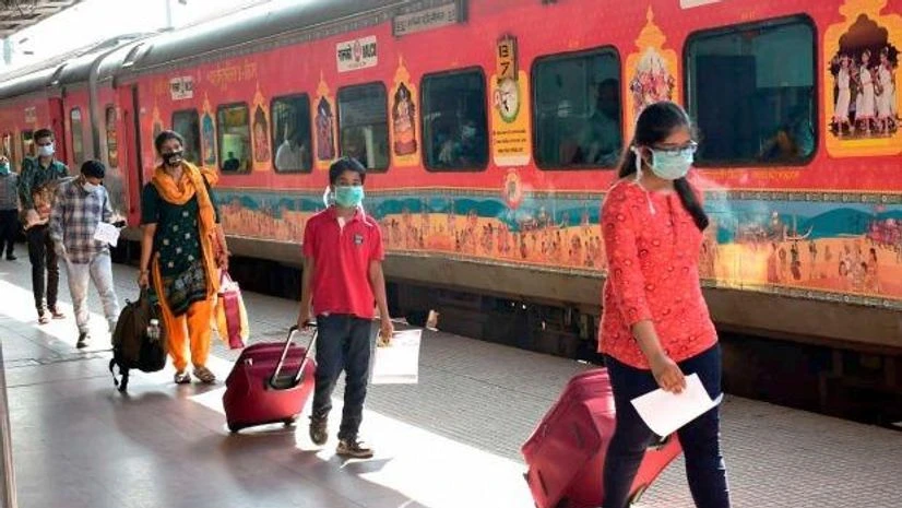 lockdown, coronavirus, Railway Station Passengers board a special train for New Delhi at Bhubaneswar railway station, during the ongoing COVID-19 lockdown, Bhubaneswar