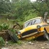A taxi damaged during Cyclone Amphan, in North 24 Parganas