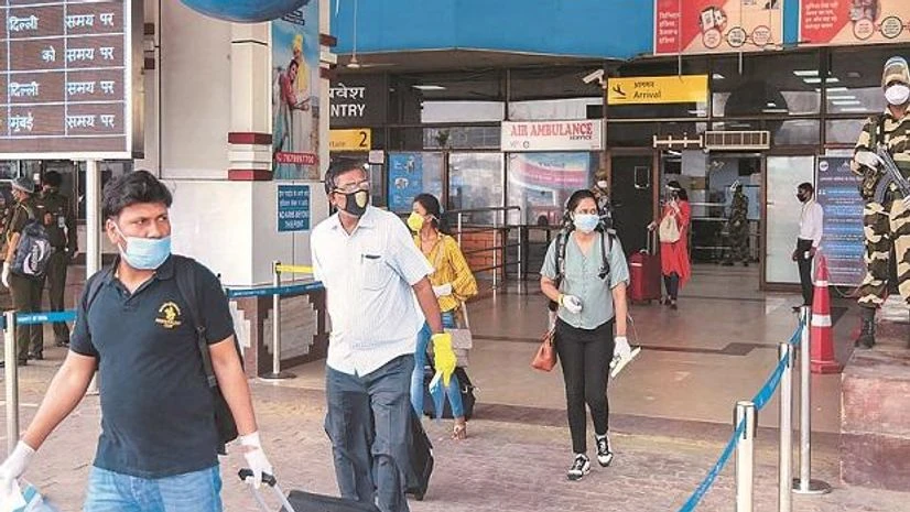 air travel, lockdown, coronavirus, shramik special Passengers from New Delhi arrive at Jai Prakash Narayan International Airport, Patna, Tuesday. PTI